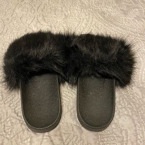 Black fuzzy slippers